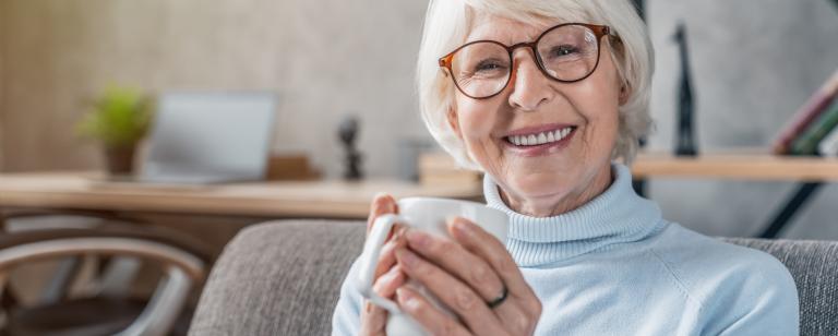 Senior woman holding mug