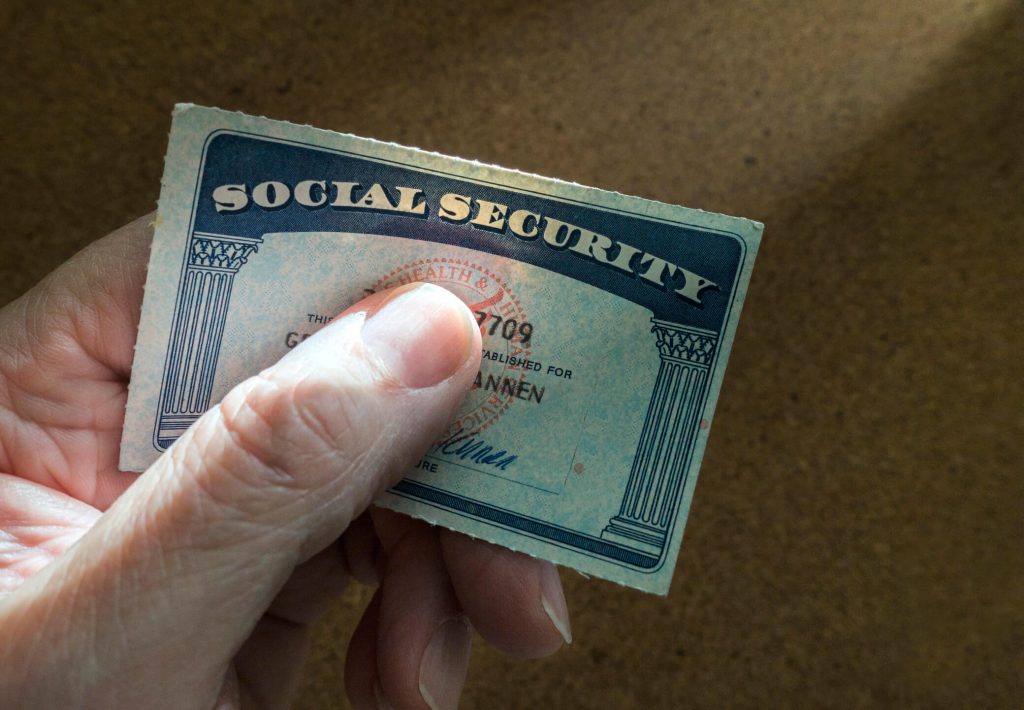 photo of senior holding a social secruity card