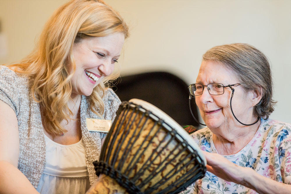 Senior woman playing drums